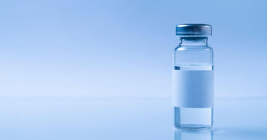 Generic pharmaceutical vial in a laboratory setting